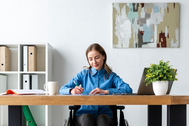 Portrait of adult woman working at the office