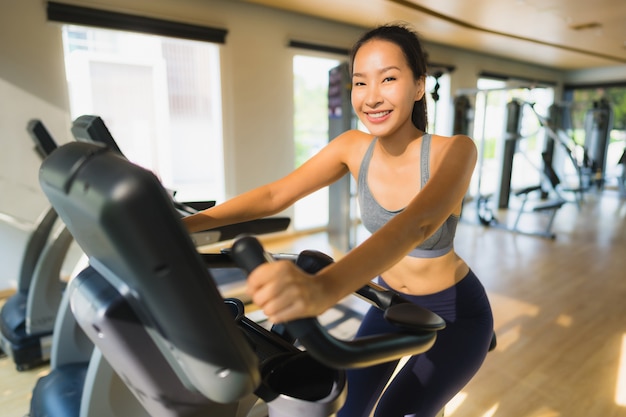 Portrait asian woman exercising and work out in gym