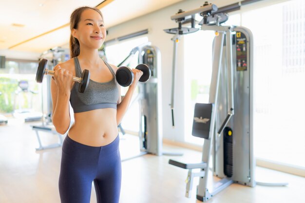 Portrait asian woman exercising and work out in gym