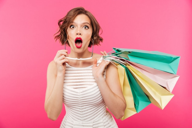 Free Photo portrait of an astonished girl dressed in dress