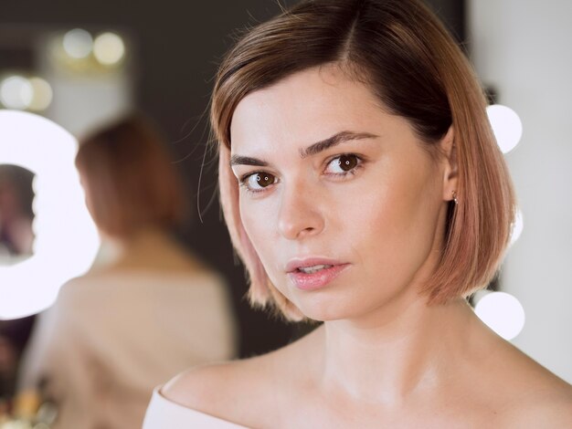 Portrait of attractive woman in studio