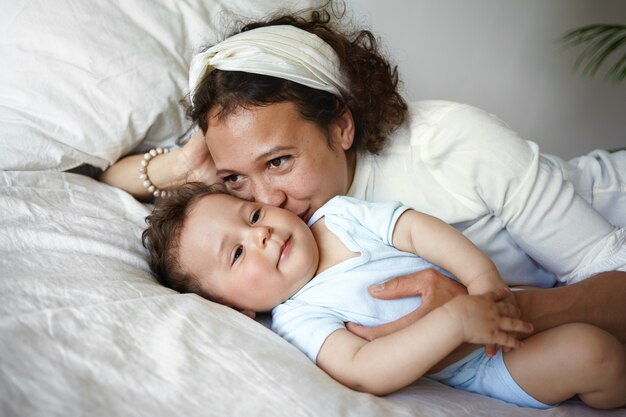 A portrait of a baby boy and mother