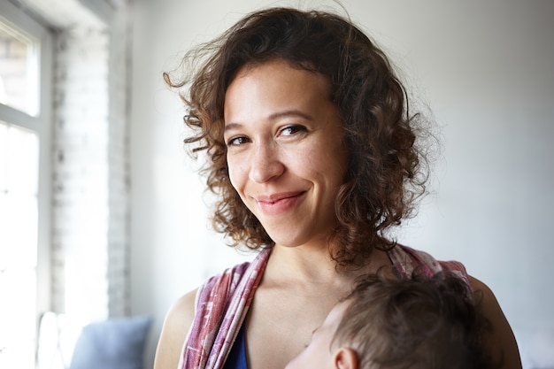 A portrait of a baby boy and mother