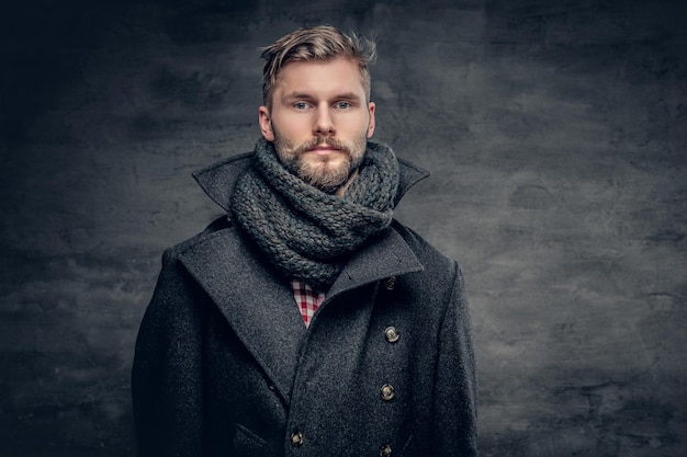 Free Photo portrait of bearded man dressed in a grey jacket.