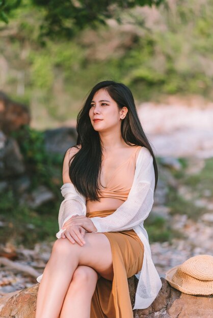 Portrait of beautiful asian woman wearing swimming suit on the beach in summer on holiday