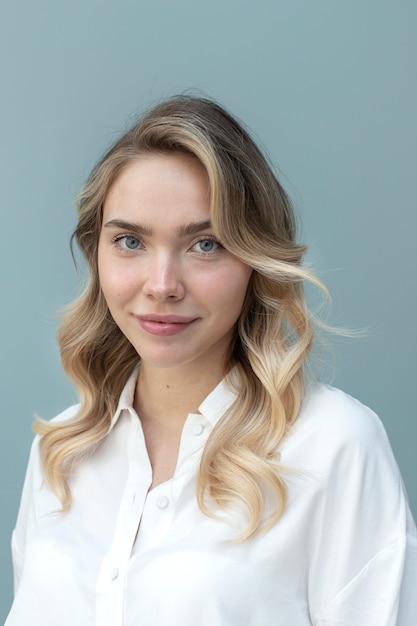 Portrait of beautiful blond woman with trendy hairstyle