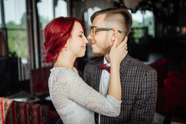 Free photo portrait of beautiful bride and elegant groom after wedding ceremony