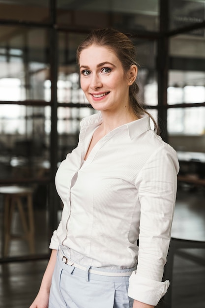 Free Photo portrait of beautiful businesswoman indoors