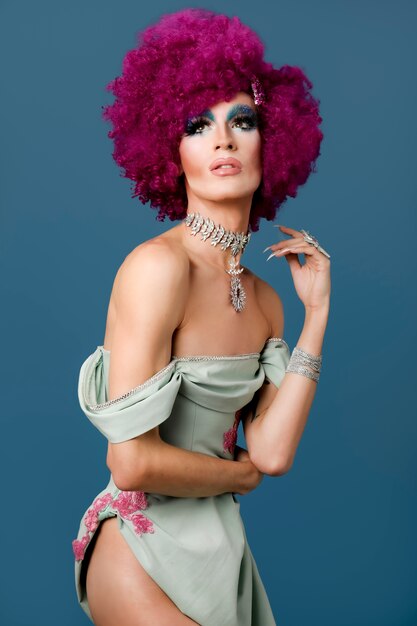 Portrait of beautiful drag person wearing makeup and wig