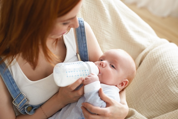 A portrait of beautiful mother with  her baby