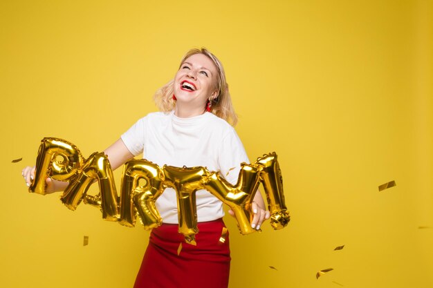 Portrait of beautiful woman celebrating a party and having fun