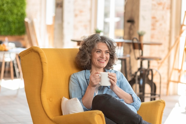 Free Photo portrait beautiful woman enjoying cup of coffee