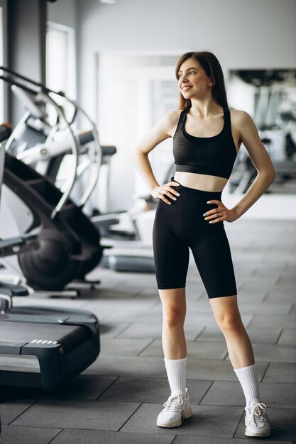 Portrait of beautiful woman instructor at the gym