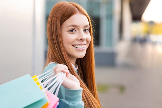 Free Photo portrait of beautiful woman looking at photographer