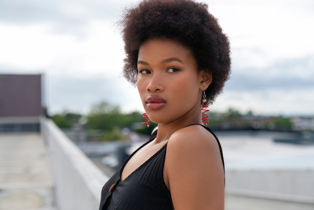 Portrait of beautiful woman posing outdoors