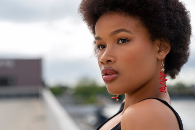 Portrait of beautiful woman posing outdoors