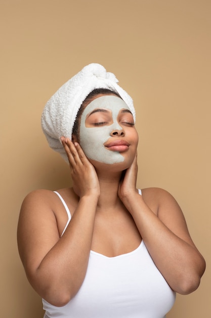 Portrait of a beautiful woman wearing face mask and posing