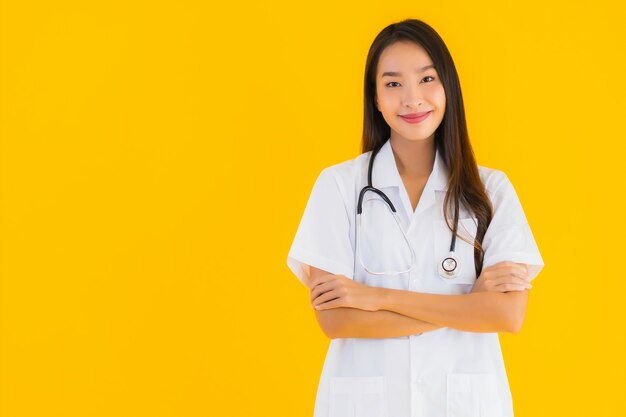 Portrait of beautiful young asian doctor woman smile happy