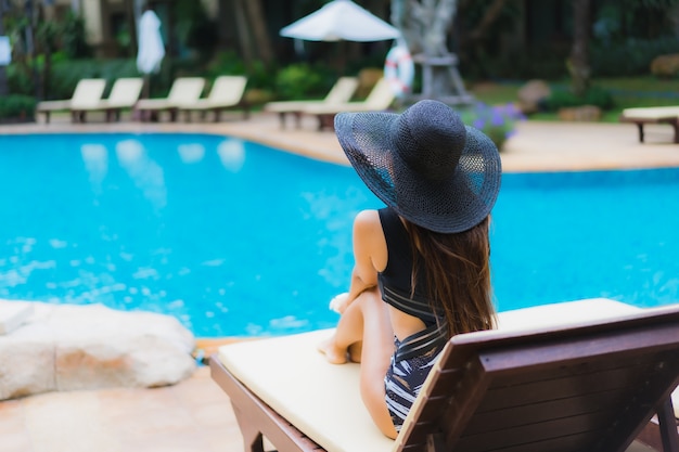 Portrait beautiful young asian woman around swimming pool