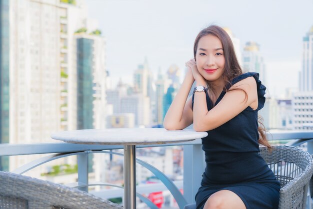 Portrait beautiful young asian woman enjoys with cocktails drink glass