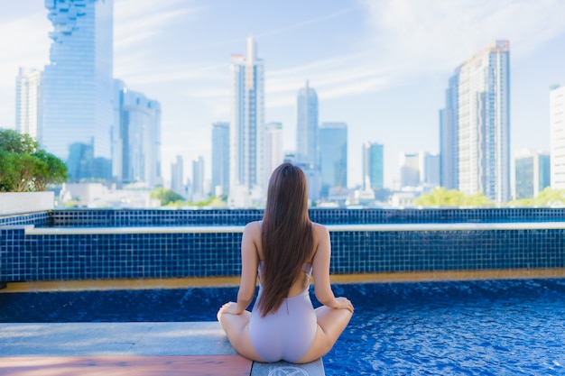 Portrait beautiful young asian woman relax leisure enjoy around outdoor swimming pool