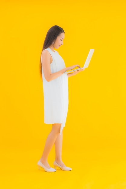 Portrait beautiful young asian woman with computer laptop