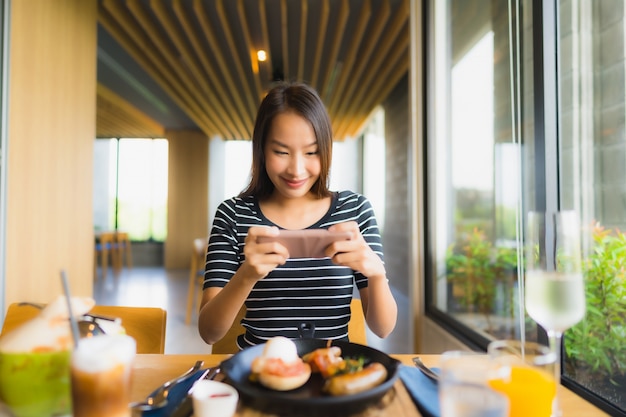 Portrait beautiful young asian women smile happy in restaurant and coffee shop cafe