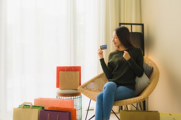 Portrait beautiful young asian women using credit card for online shopping