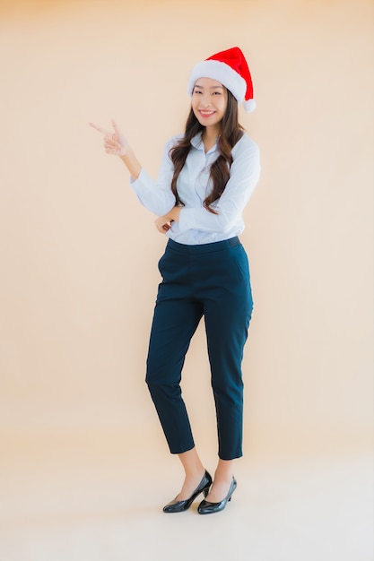 Portrait beautiful young business asian woman wear christmas hat