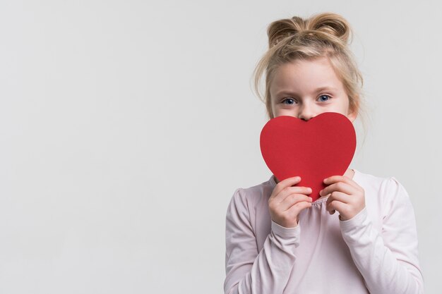 Portrait of beautiful young girl posing