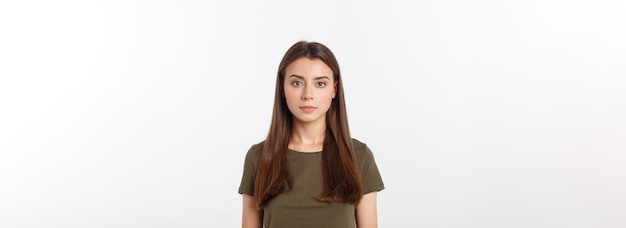 Portrait of a beautiful young woman looking at the camera and smiling isolated on a white background