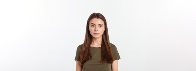 Portrait of a beautiful young woman looking at the camera and smiling isolated on a white background