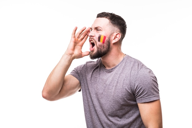 Free photo portrait of belgium football fan scream support belgium national team on white background. football fans concept.