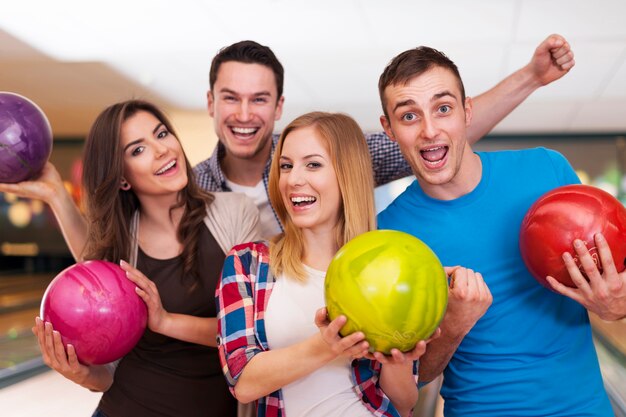 Portrait of best friends at the bowling alley