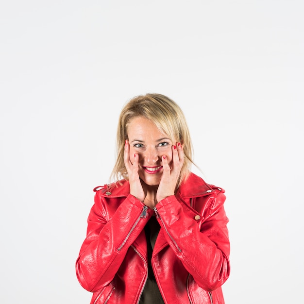 Portrait of a blonde surprised mature woman isolated on white backdrop