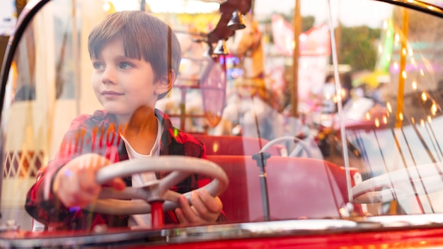 Portrait boy in amusement park