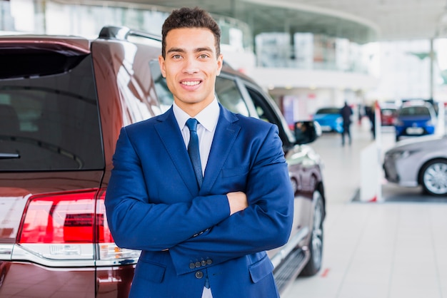 Portrait of car salesman