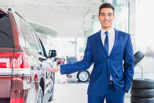 Portrait of car salesman