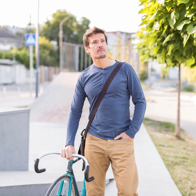 Portrait of casual male posing outdoors