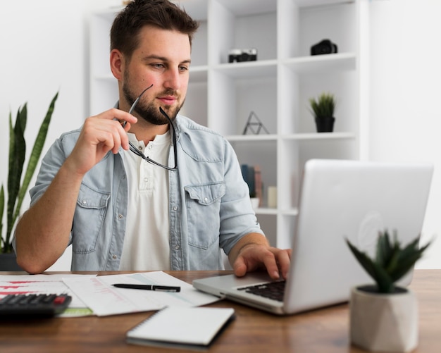 Portrait of casual male working from home