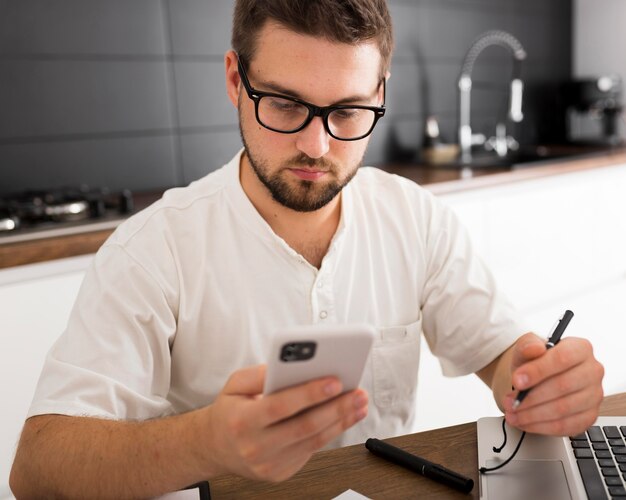 Portrait of casual male working from home