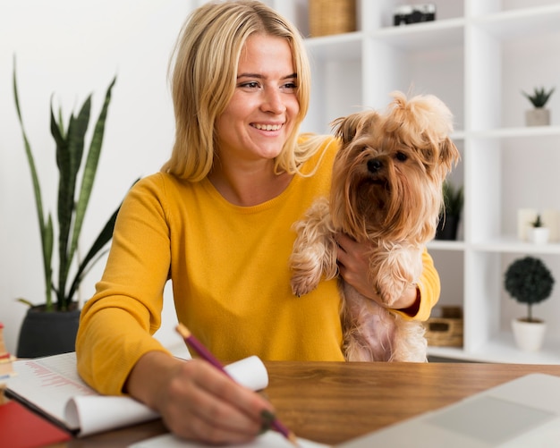 Free Photo portrait of casual woman working from home