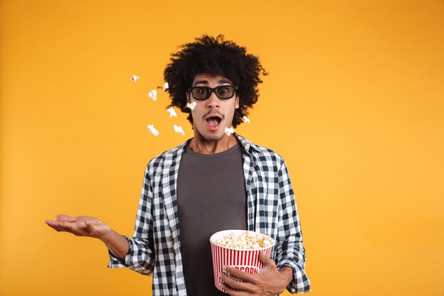 Portrait of a cheerful afro american man in 3d glasses