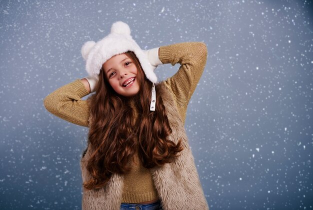 Portrait of cheerful girl at studio shot