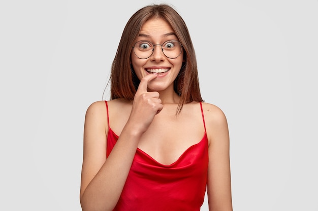 Portrait of cheerful positive woman with toothy smile