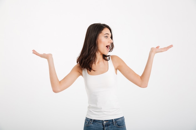 Portrait of a cheerful woman dressed in tank-top