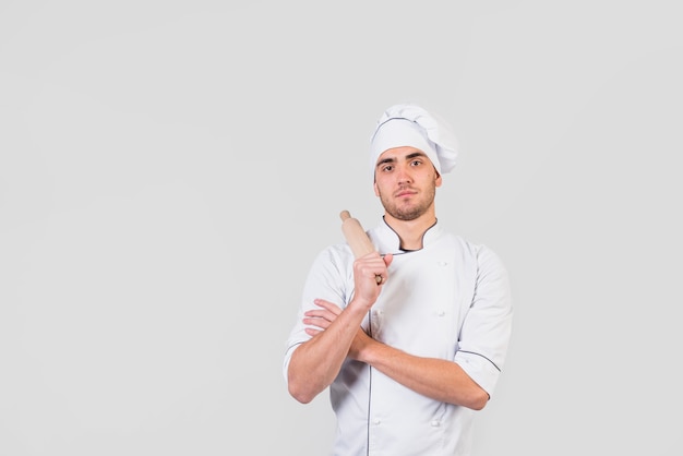 Portrait of chef with rolling pin