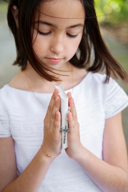 Portrait of child getting ready for their first communion