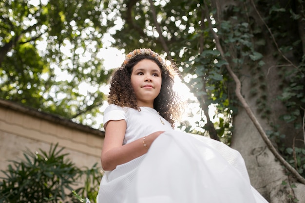 Portrait of child getting ready for their first communion