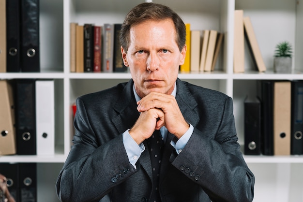 Free Photo portrait of contemplated mature businessman